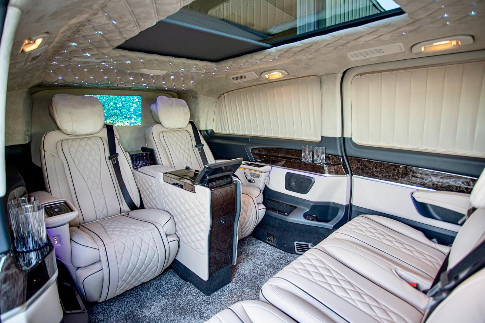 Senzati Jet Class interior with starlight ceiling and white leather — VIP minibus London FFGR London 8 pax